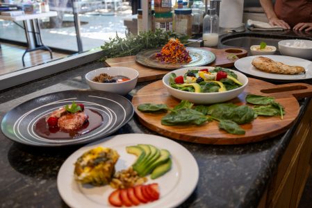 Plates of fresh, whole-food meals prepared at Alternative to Meds Center